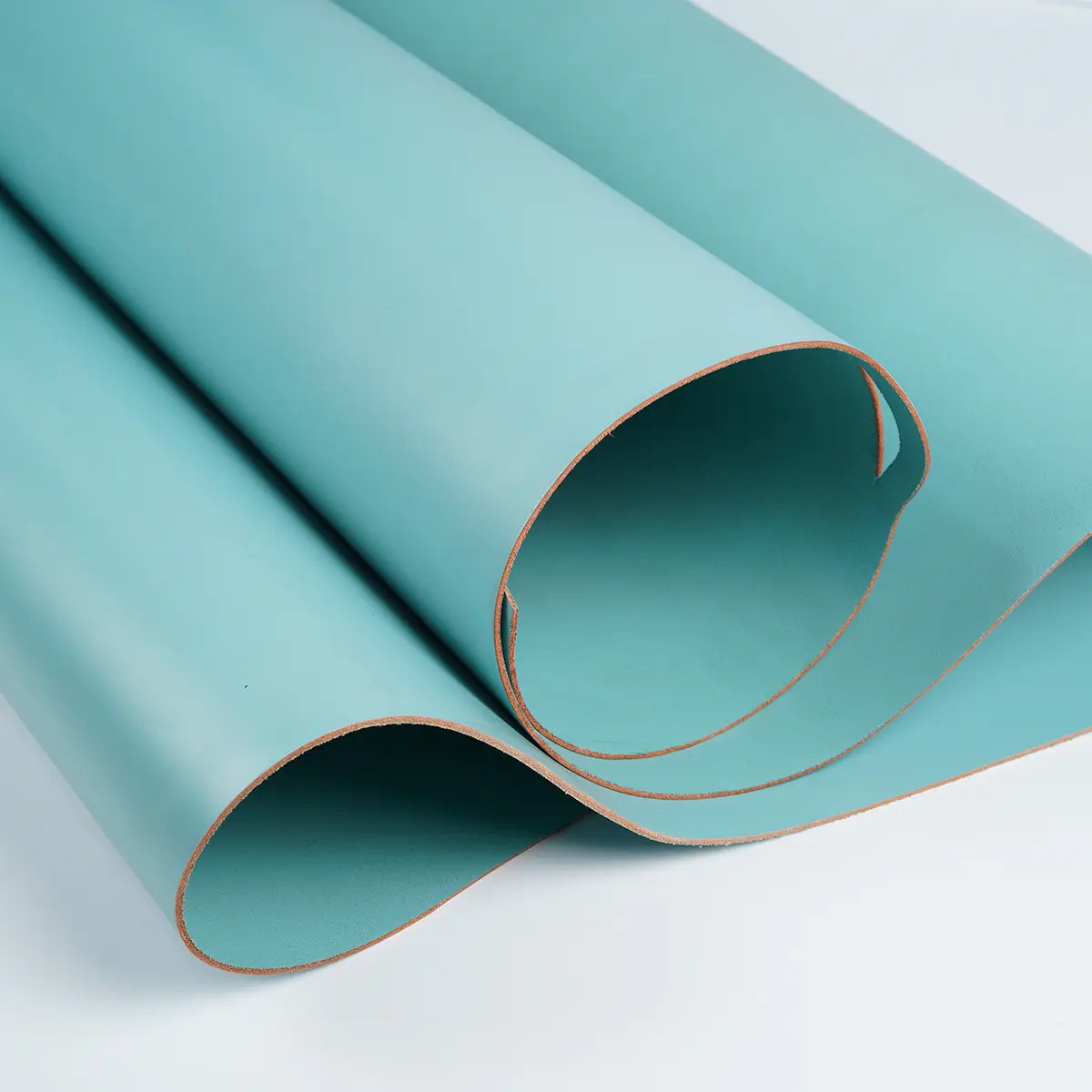 Turquoise Veg-Tan Leather in 6-7 ounce.