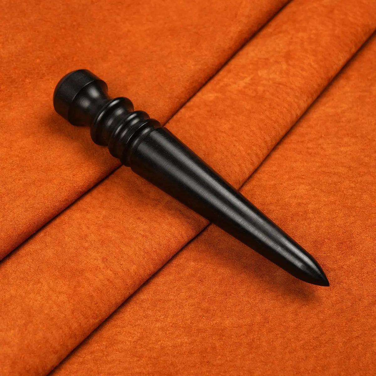 Ebony Leather Edge Burnisher.