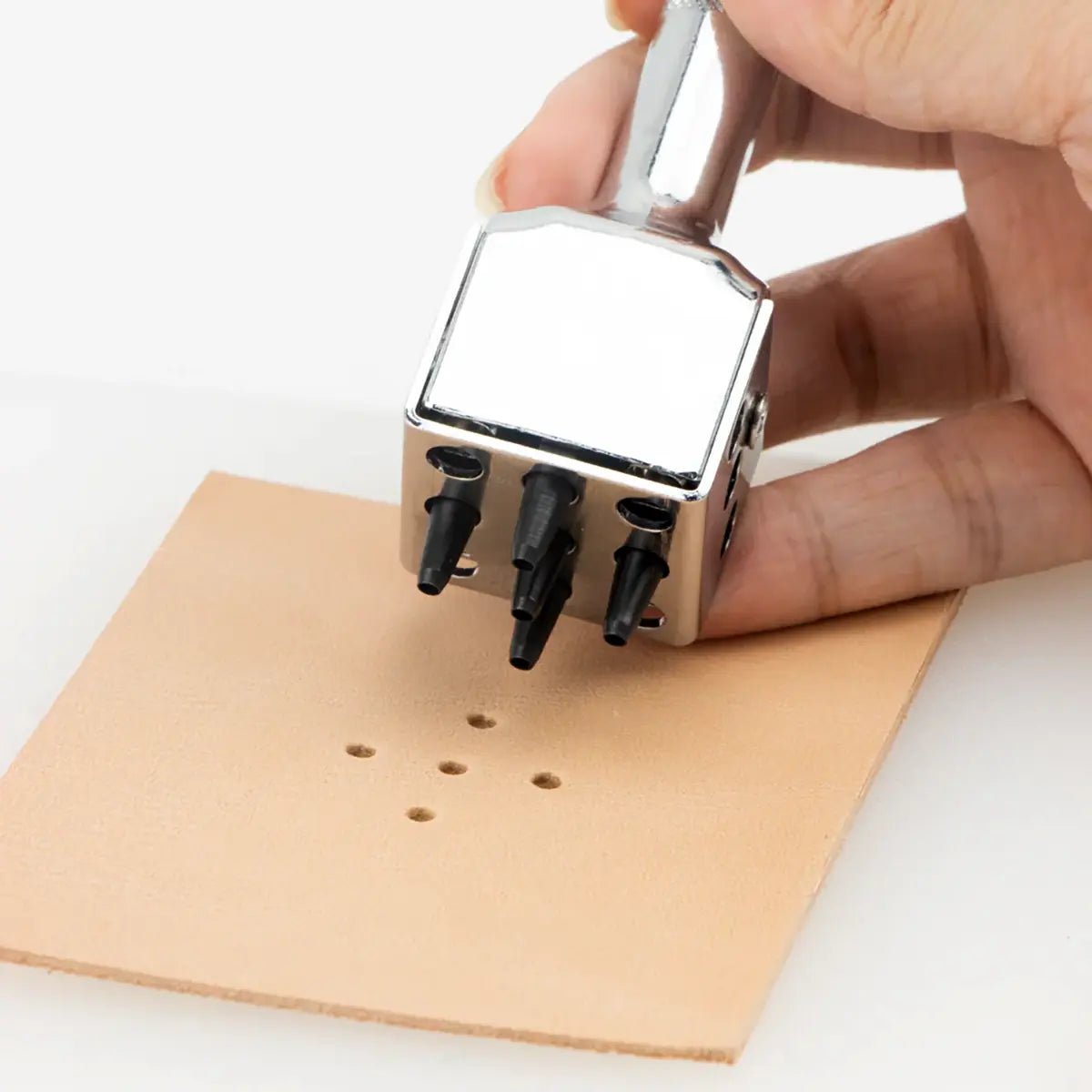 Ivan Adjustable 9-in-1 Punch.