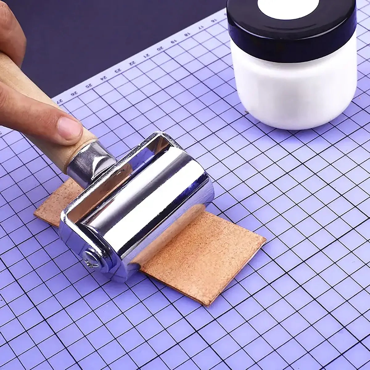 Leather Seam Roller - Light Colored Handle, 26mm, 60mm, and 100mm.