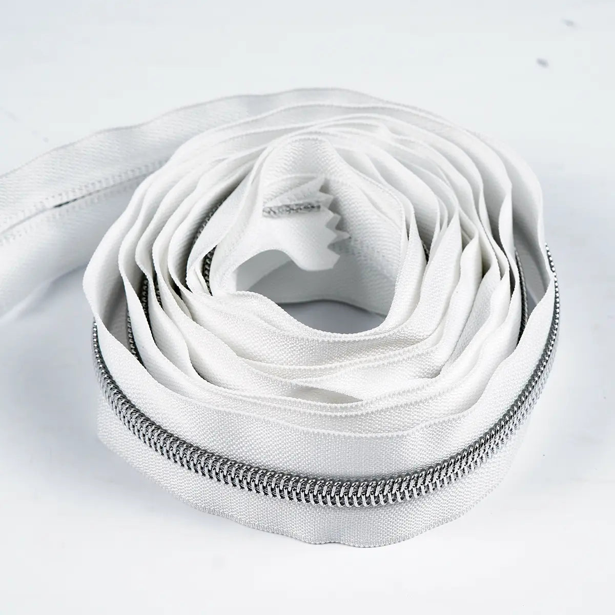 No 5 Nylon Zipper Silver Metallic, 3 Yards, White Color.