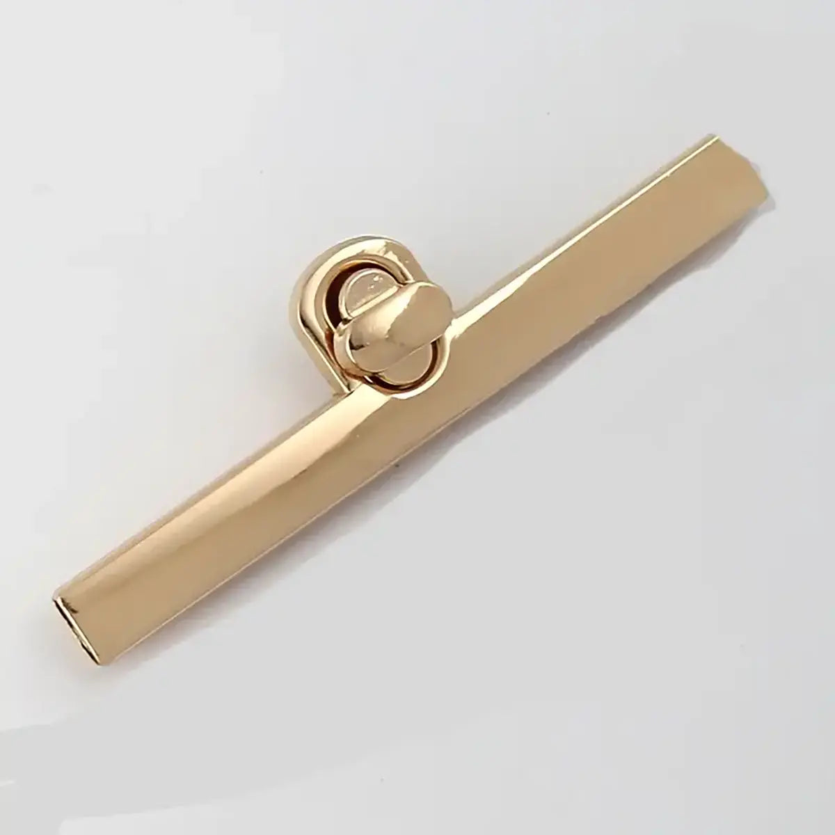 Gold Beam Twist Bag Clasp.