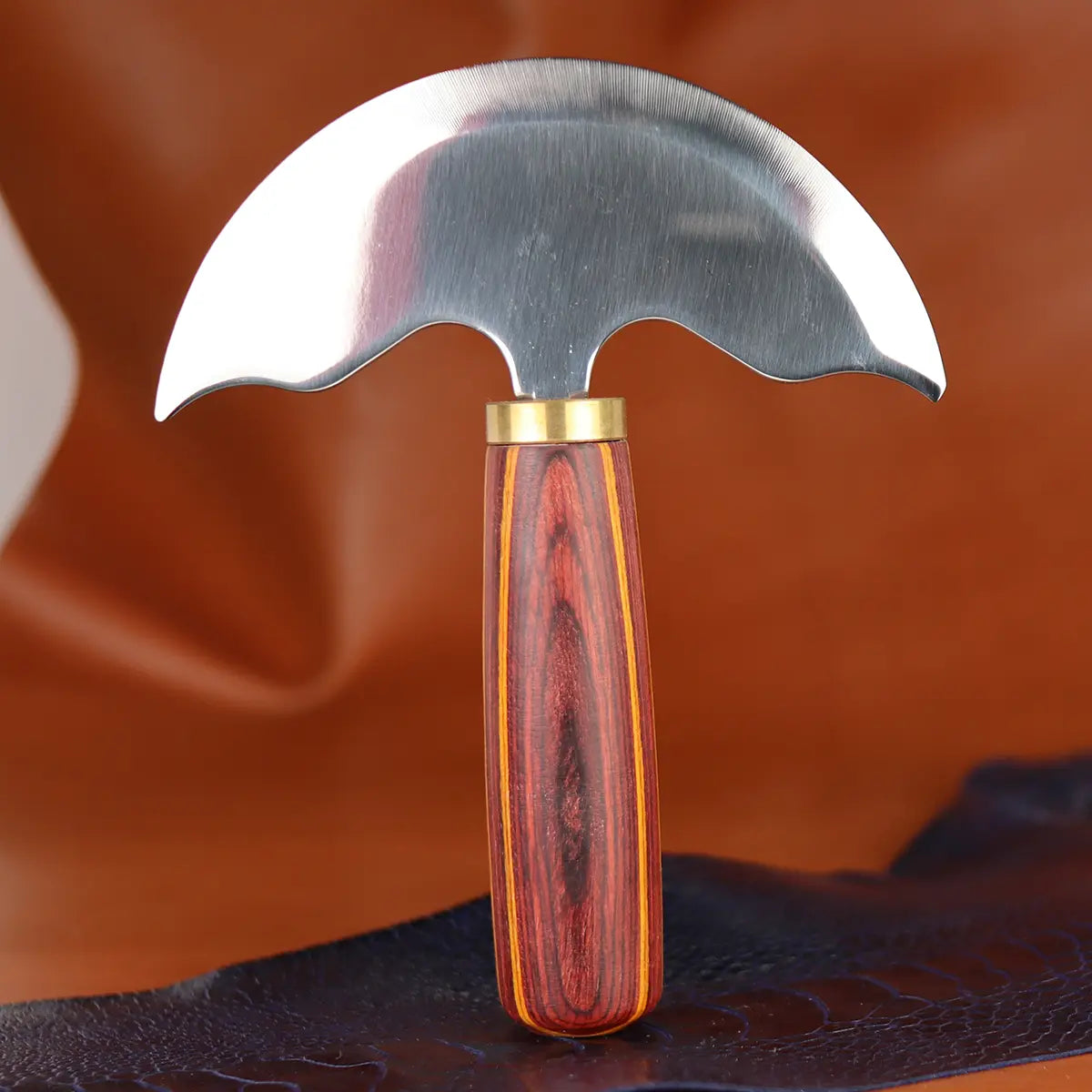 Red Handled Round Head Knife for Skiving Leather.