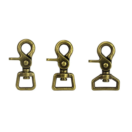 Antique Brass Trigger Snaps.