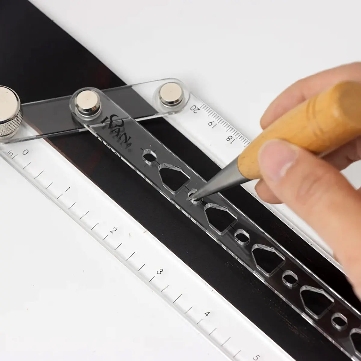 Ivan Belt Hole Center Marking and Punching Guide.