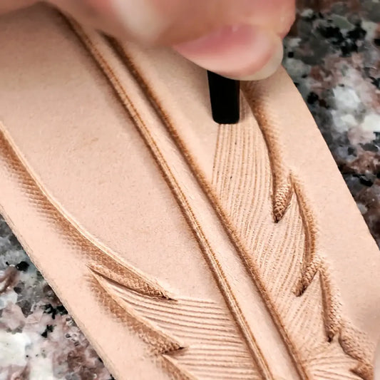Ergonomic Hair Blade Pencil Detailing a Feather.